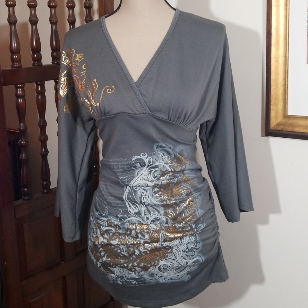 Cleo Casual pattern surplice top. Size M